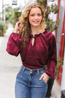 Holiday Vibes Burgundy Frill Detail Tie Neck Satin Top (Open Pack)