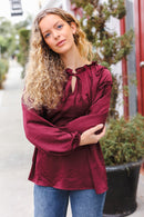 Holiday Vibes Burgundy Frill Detail Tie Neck Satin Top (Open Pack)