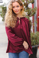 Holiday Vibes Burgundy Frill Detail Tie Neck Satin Top (Open Pack)