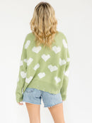 WOMEN'S LONG SLEEVE HEART PRINT DISTRESS PULLOVER SWEATER