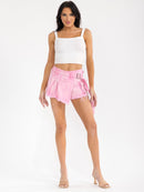 WOMEN'S BUTTON CLOSURE POCKETS RAW EDGE DENIM MINI SKORT