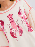 WOMEN'S SHORT SLEEVE SEQUINS GRAPHIC HIGH-LOW OVERSIZED SHIRT