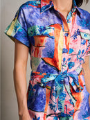 WOMEN'S SHORT SLEEVE BUTTON UP POCKETS SELF TIE FLORAL ROMPER