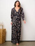 WOMEN'S LONG SLEEVE SURPLICE BELTED PRINT JUMPSUIT